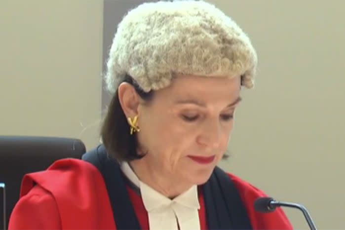 Justice Lyons was visibly emotional as she read her statement. Image: 7 News