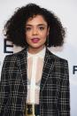 <p> Thompson adds some personality to her blunt cut curly bob by cutting a few layers within the crown. Layering naturally curly hair is the perfect way to achieve additional volume. </p>