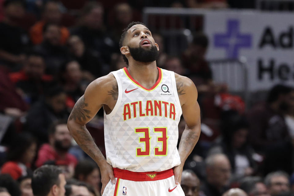 Atlanta Hawks guard/forward Allen Crabbe looks at the scoreboard during the first half of an NBA basketball game against the Chicago Bulls, Saturday, Dec. 28, 2019, in Chicago. (AP Photo/Nam Y. Huh)