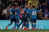 Soccer Football - La Liga Santander - Real Betis vs Real Madrid - Estadio Benito Villamarin, Seville, Spain - February 18, 2018 Real Madrid’s Karim Benzema celebrates scoring their fifth goal with teammates REUTERS/Jon Nazca