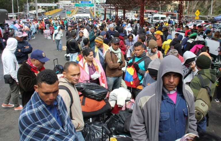 Venezuelans waiting to enter Ecuador at the Rumichaca border crossing in Colombia on August 11, 2018