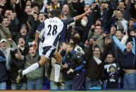 Tottenham, UNITED KINGDOM: Jermaine Jenas of Tottenham celebrates scoring their second goal against Charlton during today's Premiership clash played between Tottenham Hotspur and Charlton Athletic at Tottenham`s White Hart Lane stadium in north London, 05 February 2006. AFP PHOTO GEOFF CADDICK Mobile and website use of domestic English football pictures subject to subscription of a license with Football Association Premier League (FAPL) tel : +44 207 298 1656. For newspapers where the football content of the printed and electronic versions are identical, no licence is necessary. (Photo credit should read Geoff Caddick/AFP via Getty Images)