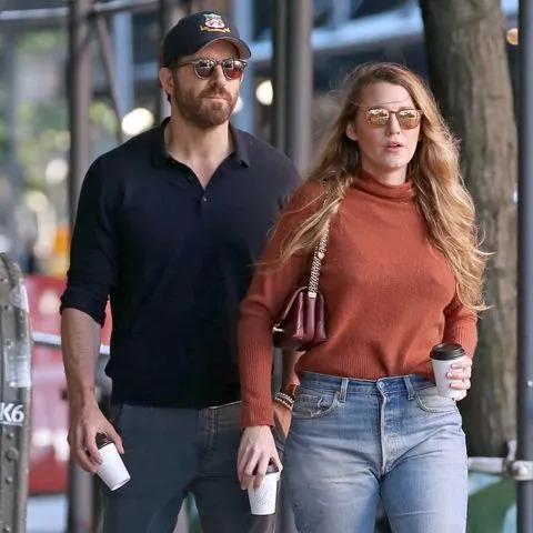 <p>Christopher Peterson / SplashNews.com</p> Ryan Reynolds and Blake Lively get cozy on a curb for their morning coffee in New York City. The couple chatted intimately for 10 minutes oblivious to passing strangers.