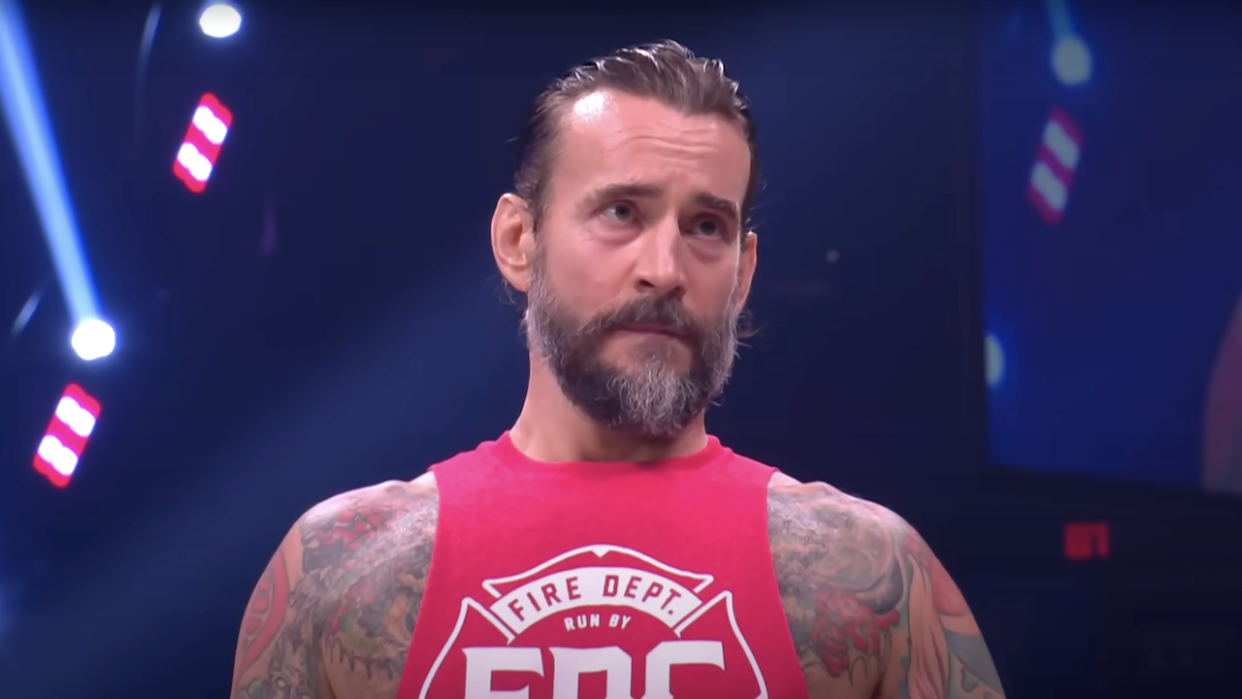  Cm punk in the ring for aew. 