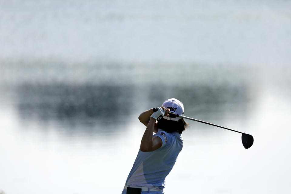 Jennifer Song drives the ball over water on the 18th hole during the second round of the LPGA Pure Silk Championship at Kingsmill Resort Friday May 24, 2019. (Jonathon Gruenke/The Daily Press via AP)