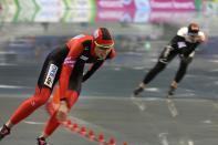 NAGANO, JAPAN - DECEMBER 09: Gabriele Hirschbichler of Germany (L) and Brittany Schussler of Canada compete in the Women's 1,000m during day two of the ISU World Cup Speed Skating at MWave on December 9, 2012 in Nagano, Japan. (Photo by Ken Ishii/Getty Images)