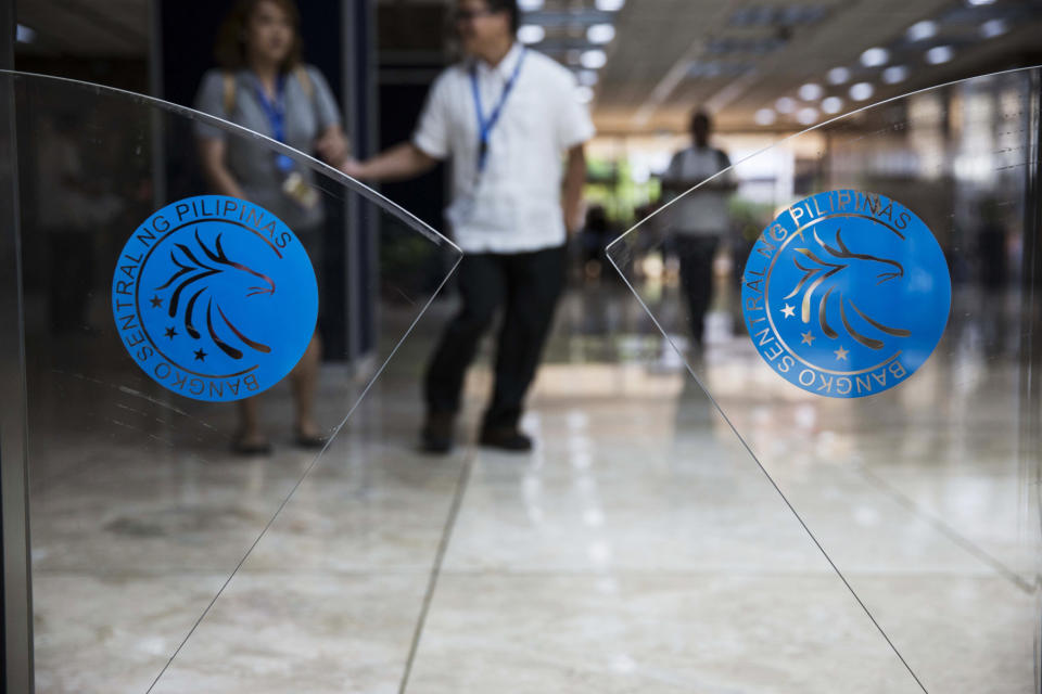 The Bangko Sentral ng Pilipinas logo is displayed on an automatic barrier at its headquarters in Manila, the Philippines. (Photo: Getty Images)