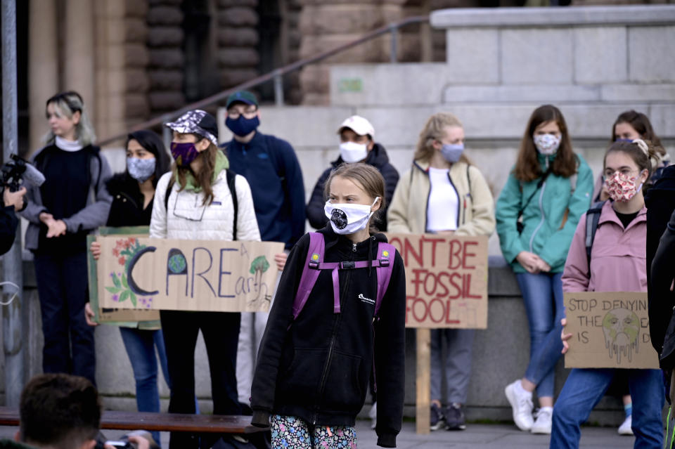 Swedish climate activist Greta Thunberg and others protest in front of the Swedish Parliament Riksdagen in Stockholm Friday, Sept. 25, 2020. ( Janerik Henriksson/TT News Agency via AP)