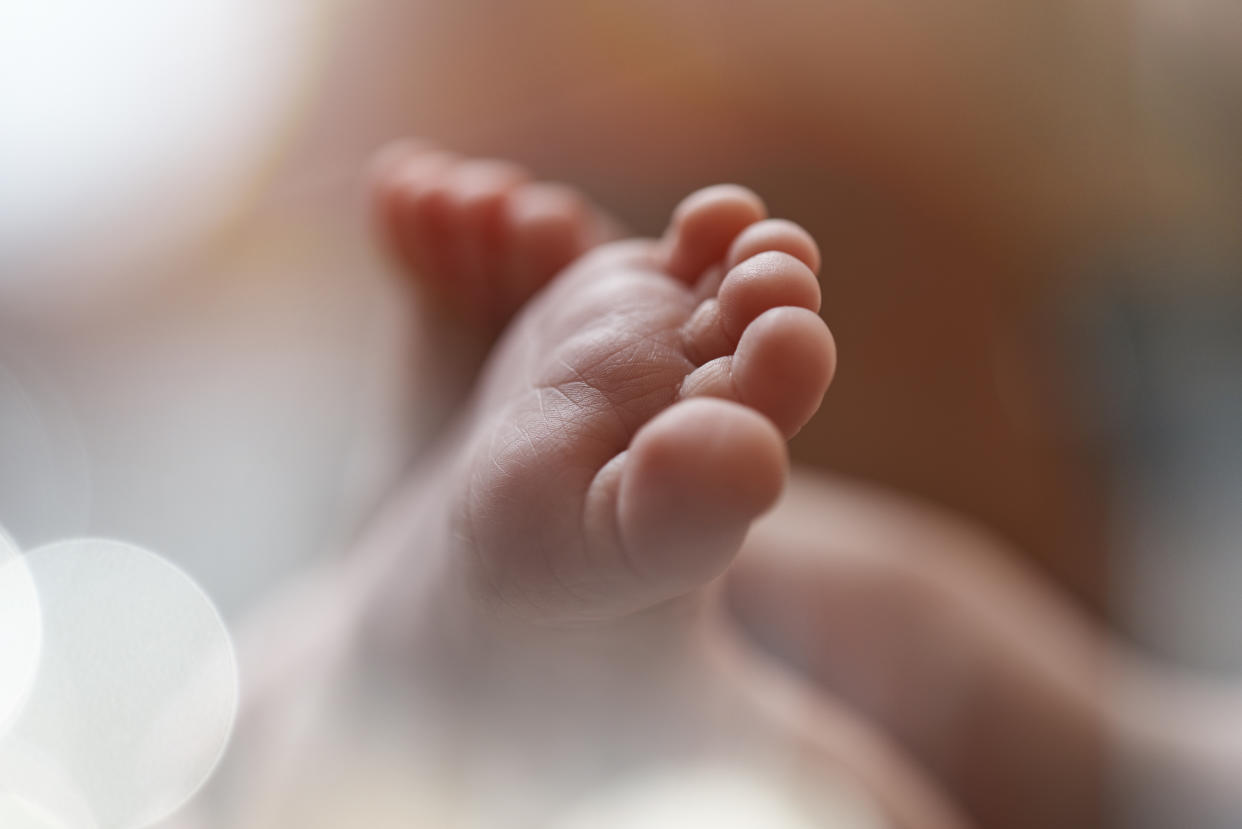 The babies mother gave birth in secret while babysitting. (Getty)