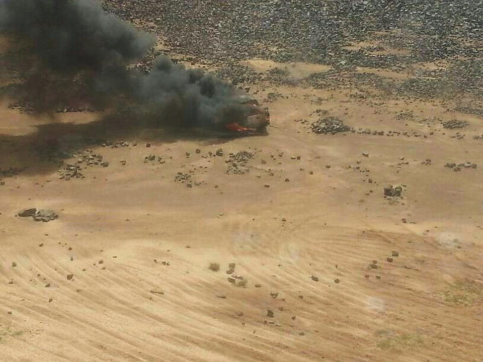 This aerial photo shows a truck burning after a Jordanian air strike on a convoy at the border between Jordan and Syria on Wednesday, April 16, 2014. Jordanian military warplanes struck a convoy of vehicles as they were trying to enter Jordan from Syria, the army said in a statement Wednesday, in an unusual move at a time of tensions between the desert kingdom and Damascus.(AP Photos/Ammonnews)