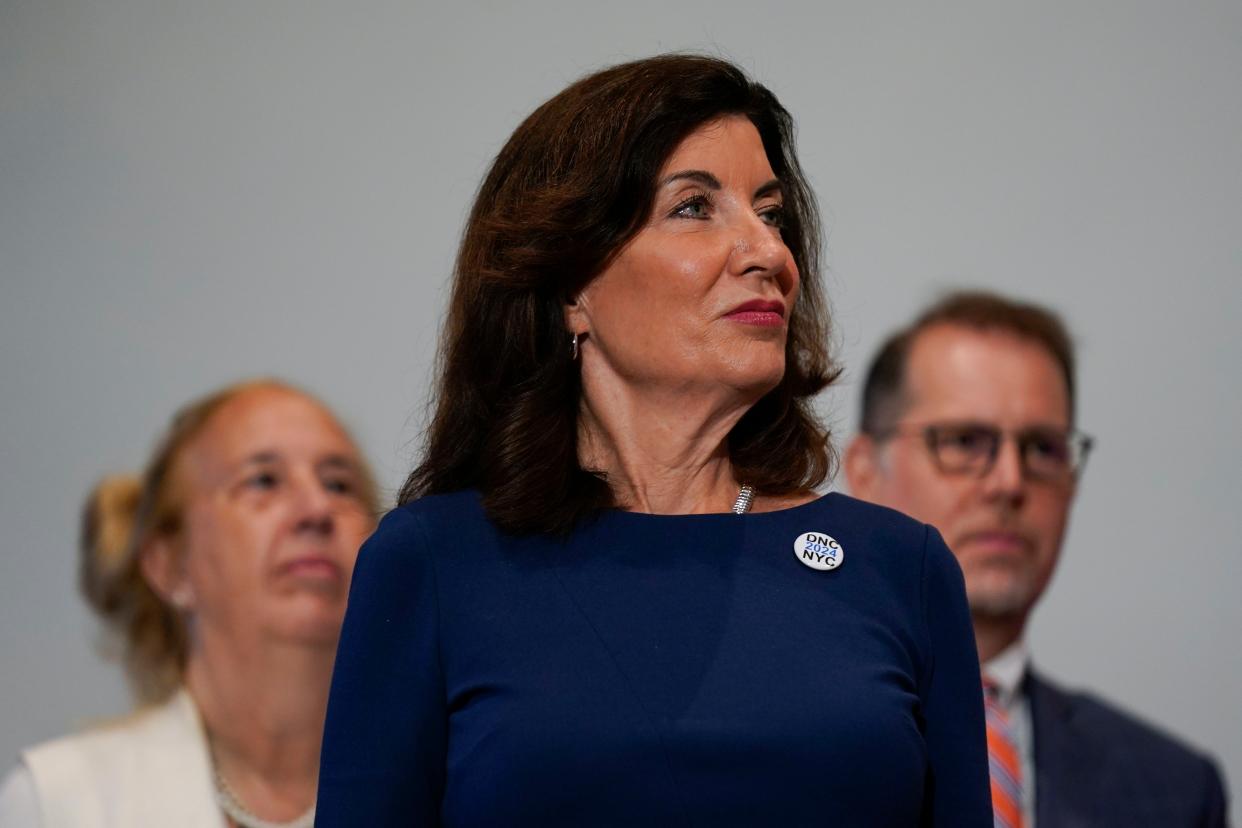 New York Governor Kathy Hochul listens to speakers during a news conference in New York, Thursday, July 21, 2022. Hochul and other officials met with democratic party representatives as part of city's bid to host the 2024 Democratic National Convention. (AP Photo/Seth Wenig)