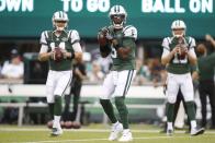 New York Jets quarterback Teddy Bridgewater (5) warms up with teammates Sam Darnold (14) and Josh McCown (15) before a preseason NFL football game against the Atlanta Falcons, Friday, Aug. 10, 2018, in East Rutherford, N.J. (AP Photo/Adam Hunger)