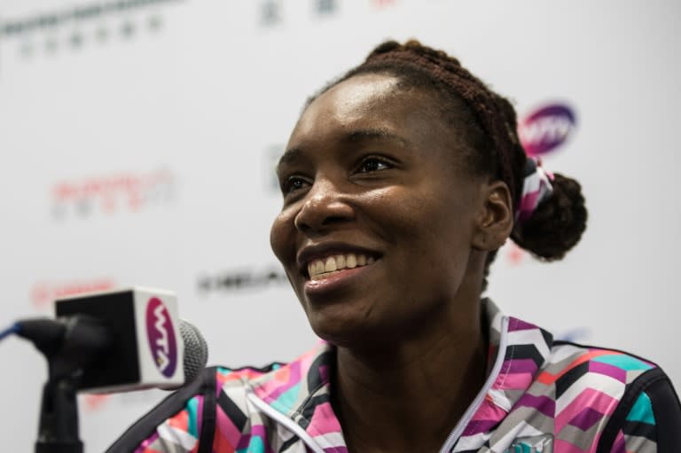 Venus Williams of the US smiles during a press conference ahead of the Hong Kong Open tennis tournament in Hong Kong on October 10, 2015