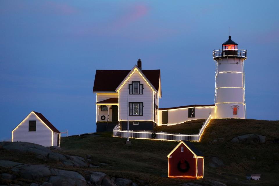 Nubble Lighthouse keeper Matt Rosenberg speaks about what goes into lighting the lighthouse for Christmas each year on Monday, Dec. 5, 2022, in York.