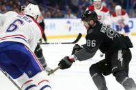 Feb 16, 2019; Tampa, FL, USA; Tampa Bay Lightning right wing Nikita Kucherov (86) skates with the puck as Montreal Canadiens defenseman Shea Weber (6) defends during the third period at Amalie Arena. Mandatory Credit: Kim Klement-USA TODAY Sports