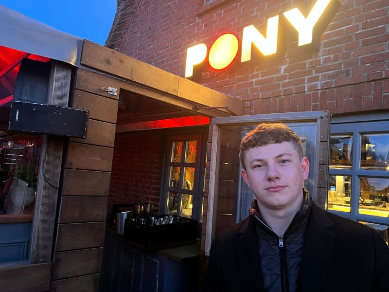 Luca Huth from Sylt is standing on the terrace of the "Pony" club in Kampen (Sylt) on Friday evening. A video shared online of young Germans chanting racist anti-immigrant slogans outside a pub on the North Sea island of Sylt has sparked outrage in the country. Lea Sarah Albert/dpa