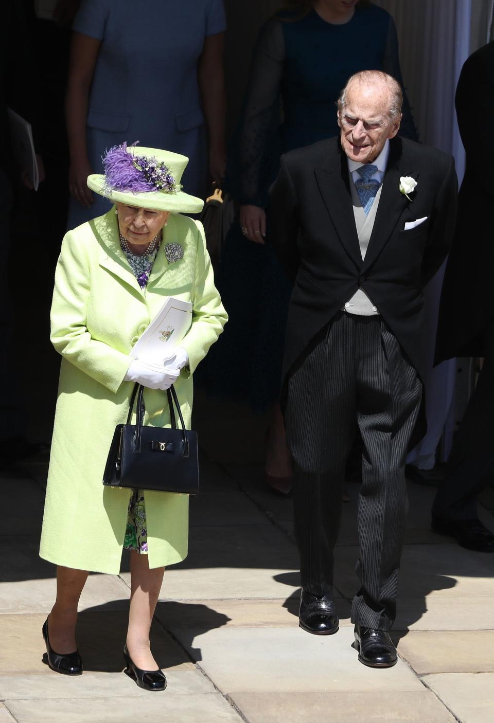 The royal grandparents attend the royal wedding of grandson Prince Harry to Meghan Markle on May 19, 2018.