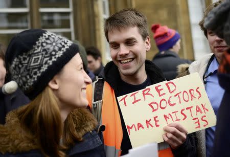 Protestors demonstrate during a doctors strike outside The Museum of The History of Science in Oxford, Britain February 10, 2016. REUTERS/Dylan Martinez