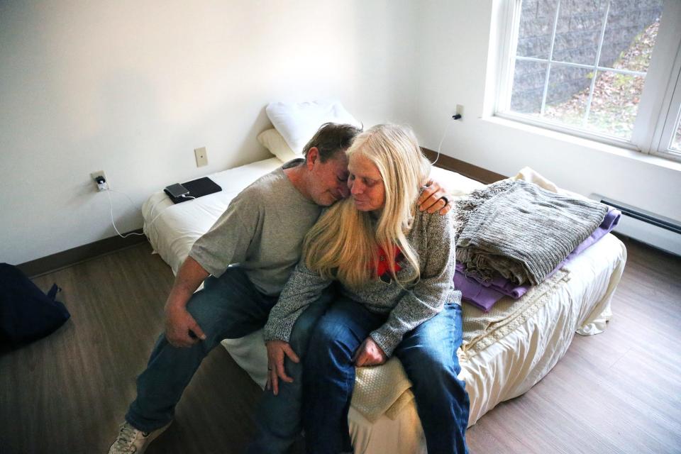 After 10 months of living in a tent in Sanford, Maine, Jeff and Tami Sandler celebrate their new home on Dec. 11, 2023. The couple secured a small apartment with the help of local agencies and organizations.