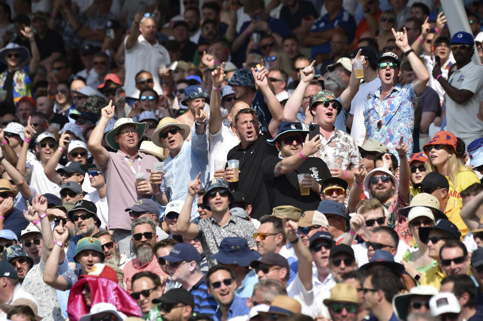 Fans react as they watch from the stands on day one of the first Ashes Test cricket match between England and Australia at Edgbaston, Birmingham, England, Friday, June 16, 2023. (AP Photo/Rui Vieira)