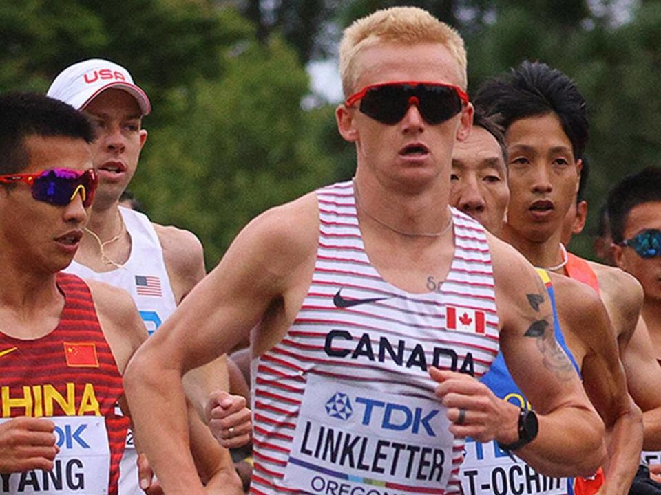 Rory Linkletter, who was born in Calgary, will not make his London Marathon debut on April 23, due to an issue with his IT (iliotibial) band, a thick band of fibrous tissue that runs on the outside of the leg. (Brian Snyder/Reuters/File - image credit)