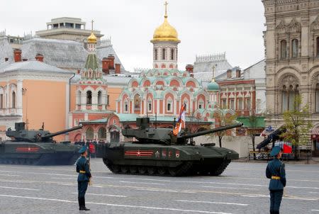 Moscow - Russia - 09/05/2017 - Russian T-14 tanks with the Armata Universal Combat Platform tanks drive during the parade marking the World War II anniversary in Moscow. REUTERS/Sergei Karpukhin