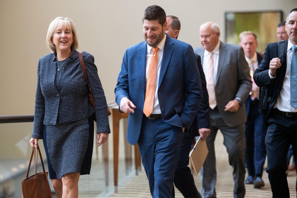 University of Tennessee Chancellor Donde Plowman, left, walks to the ball room for an infractions hearing with the NCAA at the Westin Cincinnati in Cincinnati, Ohio, on Wednesday, April 19, 2023.  