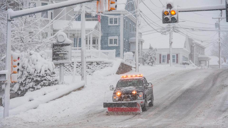 PHOTO: A snowplow clears snow from Broadway in Methuen, Massachusetts on January 7, 2024. (Joseph Prezioso/AFP via Getty Images)