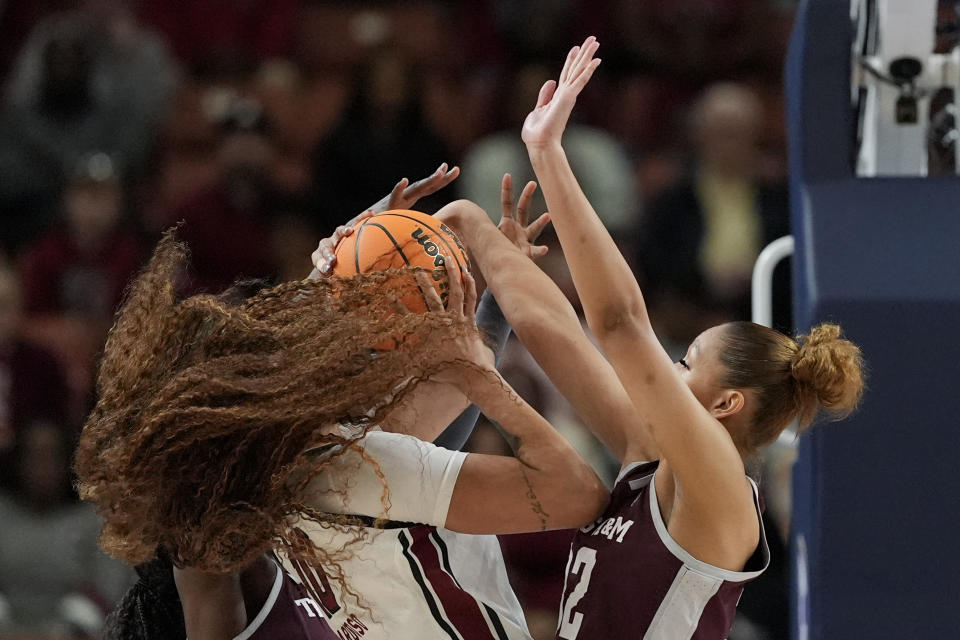 South Carolina center Kamilla Cardoso shoots over Texas A&M forward Lauren Ware during the first half of an NCAA college basketball game at the Southeastern Conference women's tournament Friday, March 8, 2024, in Greenville, S.C. (AP Photo/Chris Carlson)