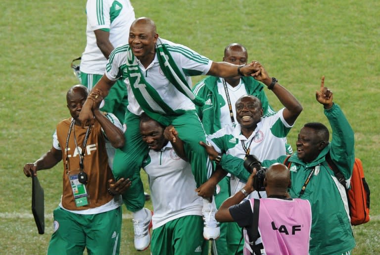 Stephen Keshi (C), pictured in 2013 when he was coach of Nigeria, carried by members of the team as they celebrate winning the African Cup of Nations