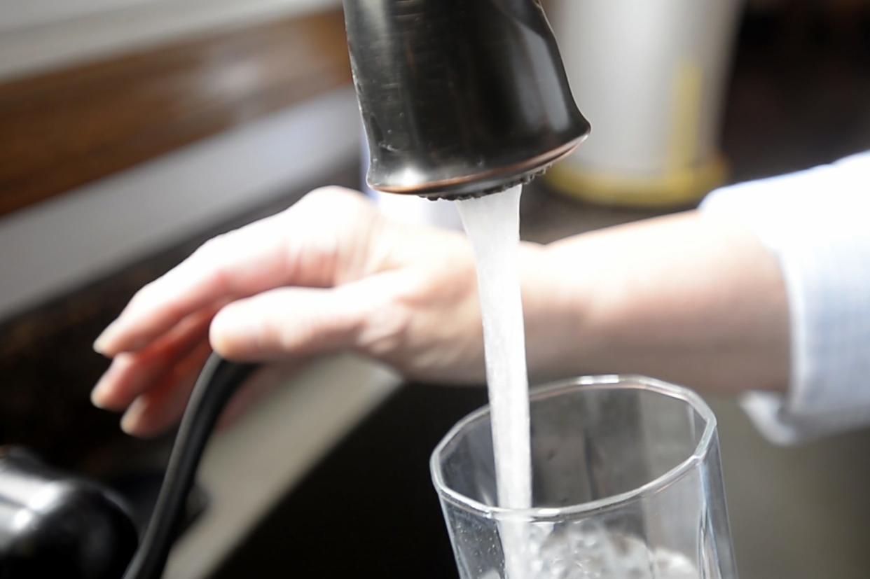 A reader asks about a mysterious slimy black material in their sinks and faucets, and wonders if the city of Asheville's tap water is safe.