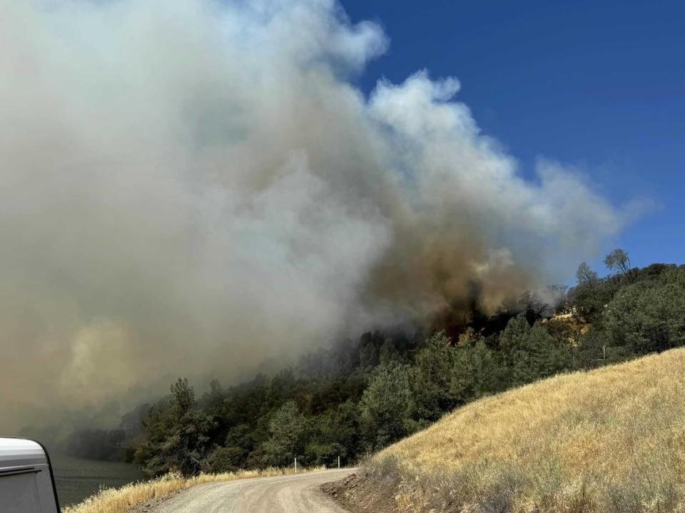 Smoke was billowing from the Thompson Fire burning Tuesday, July 2, 2024, and prompting evacuation orders in Butte County, near Oroville, California.