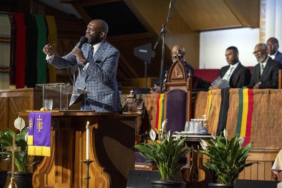 Rev. William H. Lamar IV leads a Palm Sunday service at the Metropolitan AME Church in Washington, Sunday, March 24, 2024. Lamar says their churches are still feeling the pandemic’s impact on attendance, even as they have rolled out robust online worship options to reach people. (AP Photo/Amanda Andrade-Rhoades)