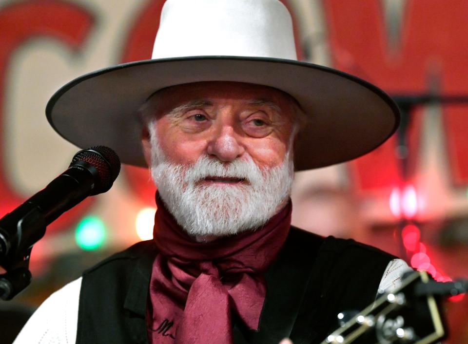 Country artist Michael Martin Murphey performs during the 89th reenactment of the Texas Cowboys’ Christmas Ball in Anson Dec. 14.