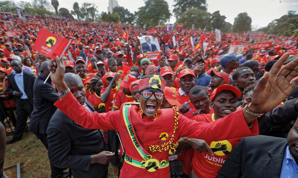 <p>Supporters of Kenya’s President Uhuru Kenyatta cheer at an election rally in Uhuru Park in downtown Nairobi, Kenya, Friday, Aug. 4, 2017. (Photo: Ben Curtis/AP) </p>