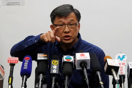 Pro-China lawmaker Junius Ho speaks during a news conference over the violence in Hong Kong