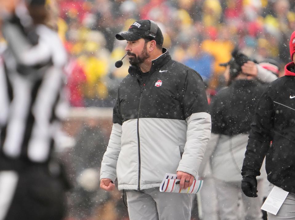 Ohio State Buckeyes head coach Ryan Day watches during the second quarter of the NCAA football game at Michigan Stadium in Ann Arbor on Saturday, Nov. 27, 2021.