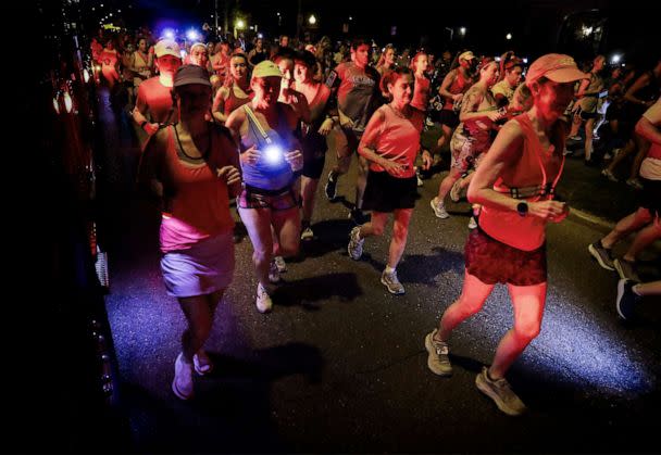 PHOTO: Thousands of runners, supporters and mourners attend a 4:20 a.m 'Let's Finish Liza's Run' event in honor of Eliza Fletcher, Sept. 9, 2022 in Memphis, Tenn. Fletcher, was kidnapped and murder while running last week. (Daily Memphian via AP))