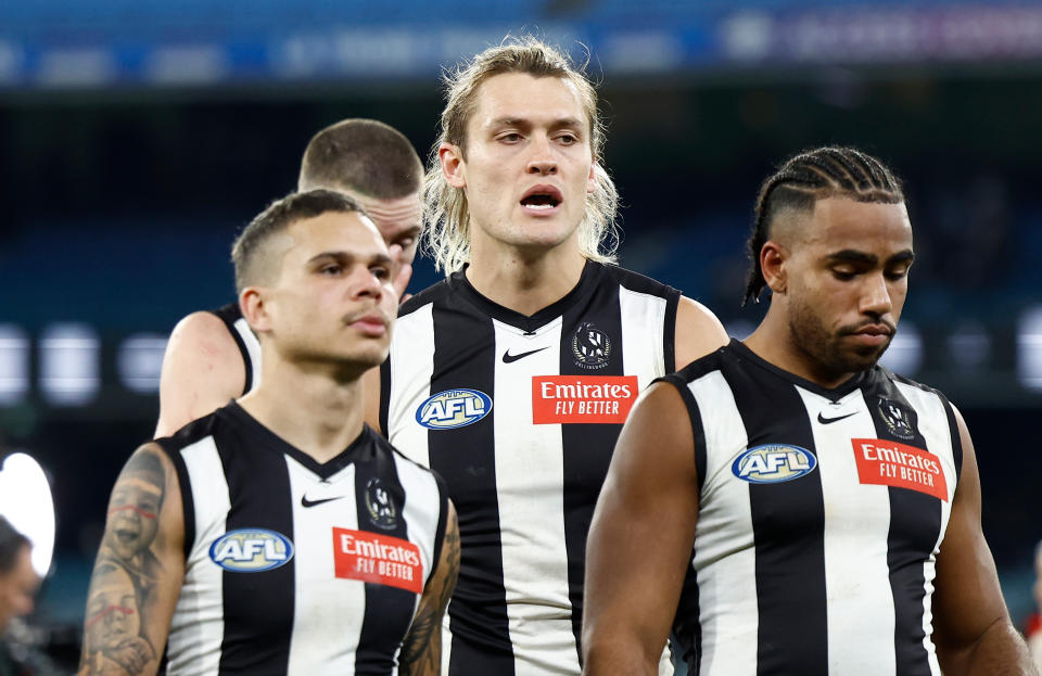 MELBOURNE, AUSTRALIA - JULY 12: Darcy Moore of the Magpies looks dejected after a loss during the 2024 AFL Round 18 match between the Collingwood Magpies and the Geelong Cats at Melbourne Cricket Ground on July 12, 2024 in Melbourne, Australia. (Photo by Michael Willson/AFL Photos via Getty Images)