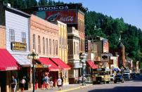 <p>Deadwood might be best known for its historic re-enactments, but it has plenty of modern-day fun for families. Feeling brave? Get an up-close-and-personal look at the black bears roaming around <a href="https://www.deadwood.com/business/attractions/bear-country-usa/" rel="nofollow noopener" target="_blank" data-ylk="slk:Bear Country USA;elm:context_link;itc:0;sec:content-canvas" class="link ">Bear Country USA</a> (from the safety of your vehicle, of course).</p>