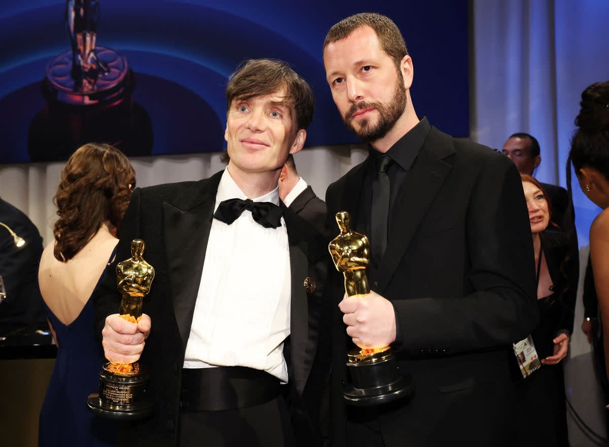 Mstyslav Chernov, winner of the Oscar for Best Documentary Feature Film for "20 Days in Mariupol" and Cillian Murphy, winner of the Best Actor Oscar for "Oppenheimer", pose at the Governors Ball following the Oscars show (REUTERS)