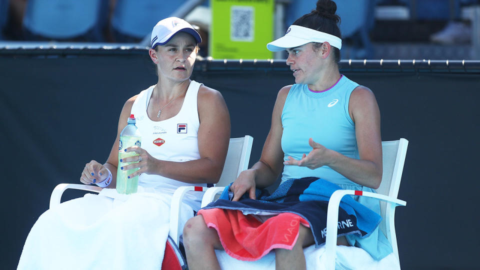 Seen here, Australian Open doubles partner Ash Barty and Jennifer Brady have a chat during a break in their match.