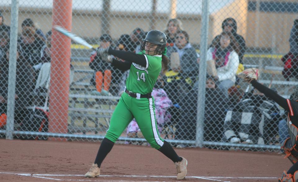 Farmington High's Legend Otero swings and misses on a high pitch during the bottom of the first inning of a game against Gallup, Tuesday, March 28, 2023 at Ricketts Park.