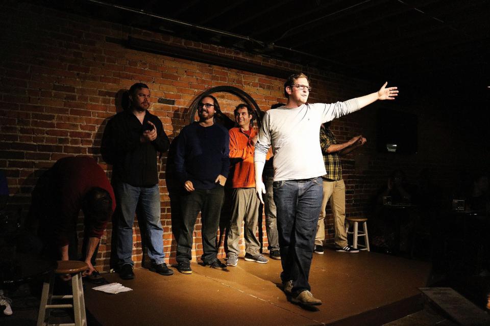 Steve Marcinowski introduces the Nutt House Improv Troup to the audience at the Dead Crow Comedy Room, 2017.