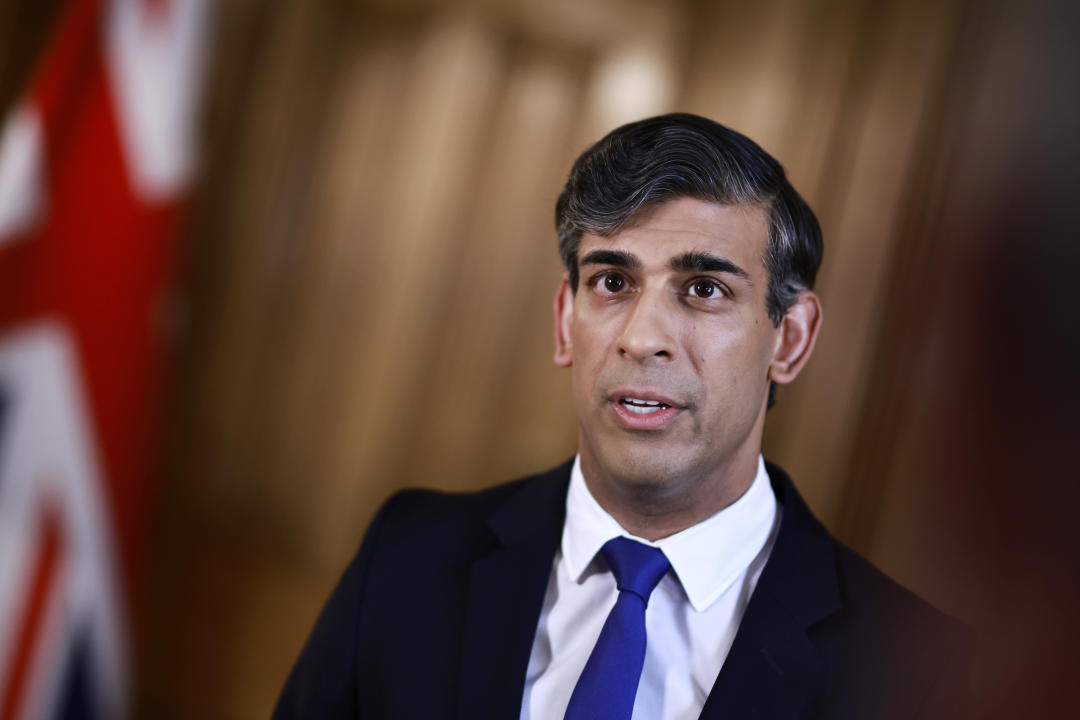 Britain's Prime Minister Rishi Sunak records a statement on the Iranian attacks on Israel overnight, inside 10 Downing Street, London, Sunday, April 14, 2024. Israel praised the success of its defenses in the face of an unprecedented attack by Iran involving hundreds of drones, ballistic missiles and cruise missiles. (Benjamin Cremel/Pool via AP)