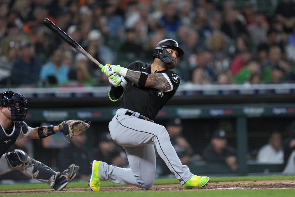 Chicago White Sox's Yoan Moncada hits a one-run single against the Detroit Tigers in the eighth inning of a baseball game, Friday, Sept. 8, 2023, in Detroit. (AP Photo/Paul Sancya)