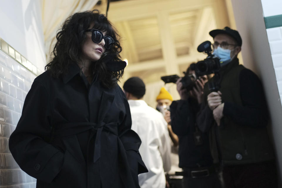 French actress Isabelle Adjani poses backstage prior to the Ami fall-winter 22/23 men's collection, in Paris, Wednesday, Jan. 19, 2022. (AP Photo/Lewis Joly)