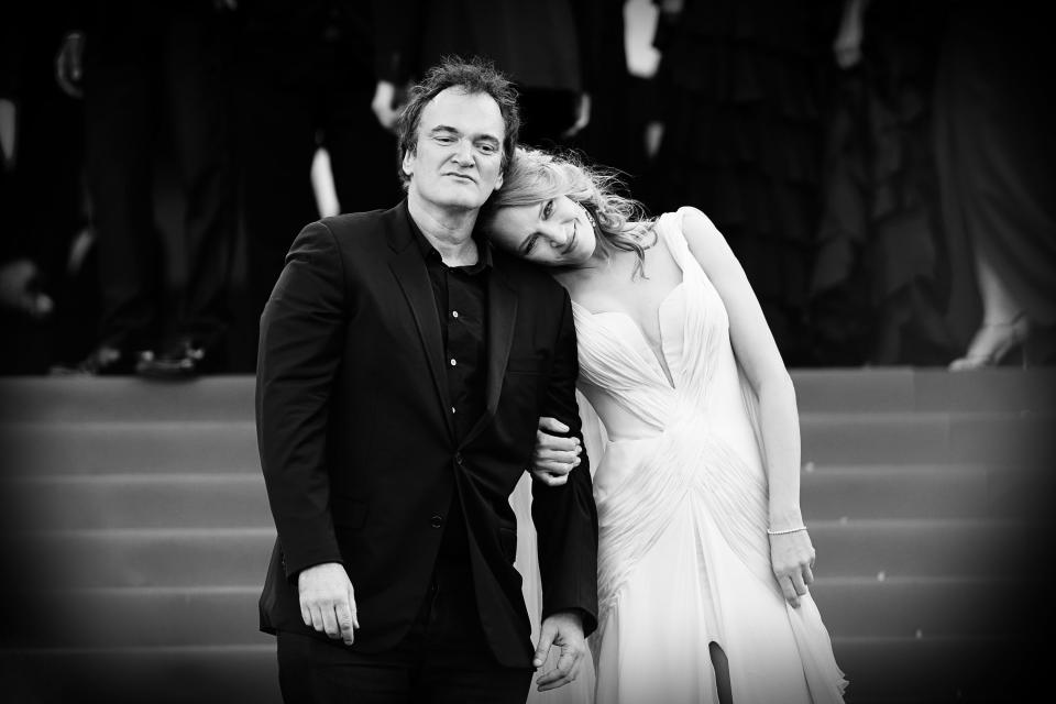 Es una de las musas de Tarantino, con quien ha rodado sus películas más famosas: 'Pulp Fiction' (1994) y las dos partes de 'Kill Bill' (2003 y 2004). En 2014 coincidieron en el Festival de Cannes, ya que el director fue el presidente del jurado. (Foto: Mike Marsland / Getty Images)