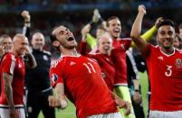 Football Soccer - Wales v Belgium - EURO 2016 - Quarter Final - Stade Pierre-Mauroy, Lille, France - 1/7/16 Wales' Gareth Bale and teammates celebrate at full time REUTERS/Carl Recine Livepic