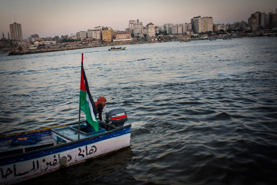 <p>Madleen Koolab takes Gazan’s out for rides on Thursday nights, a popular night for families. Madleen owns the boat and uses it to fish during the week. (Photograph by Monique Jaques) </p>